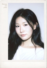 Polaroid-style portrait of Kelly Hong.